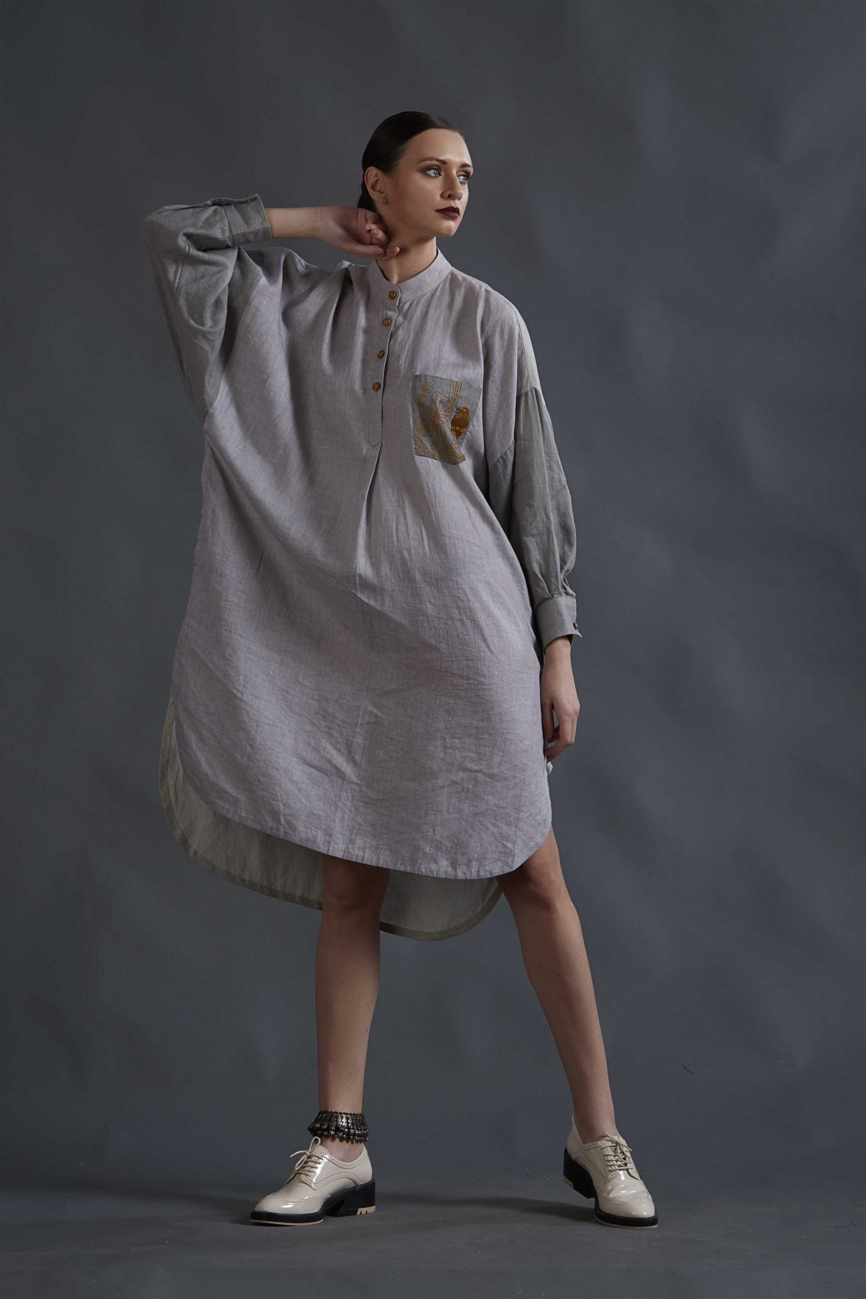 ASYMMETRICAL TUNIC TOP